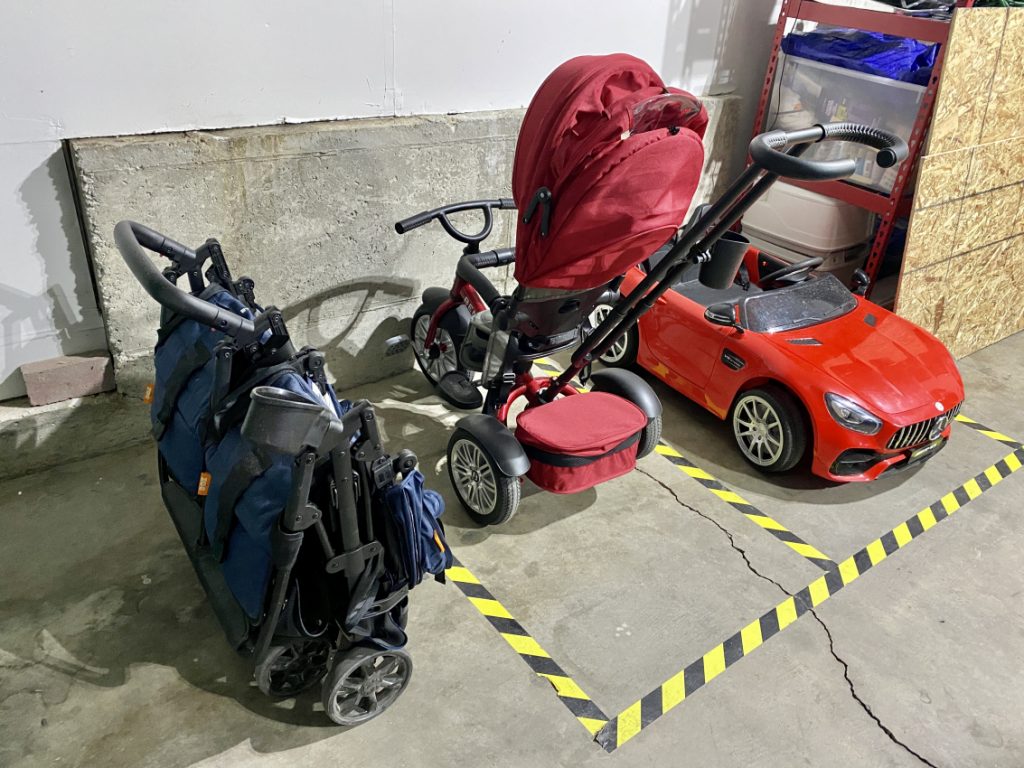 Stroller parking in the garage including Zoe twin stroller