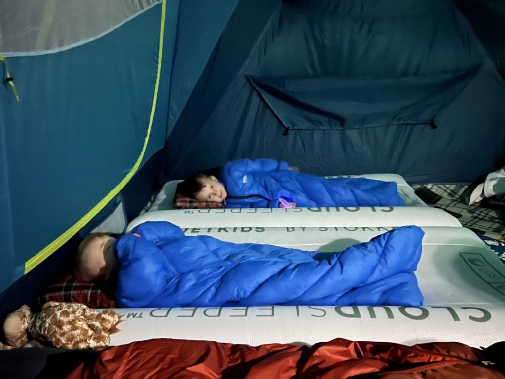 inflatable toddler bed in a tent