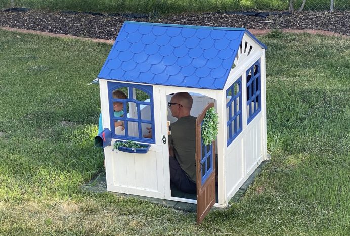 painting wooden playhouse