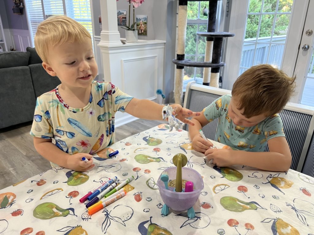 Children playing with scrubbies